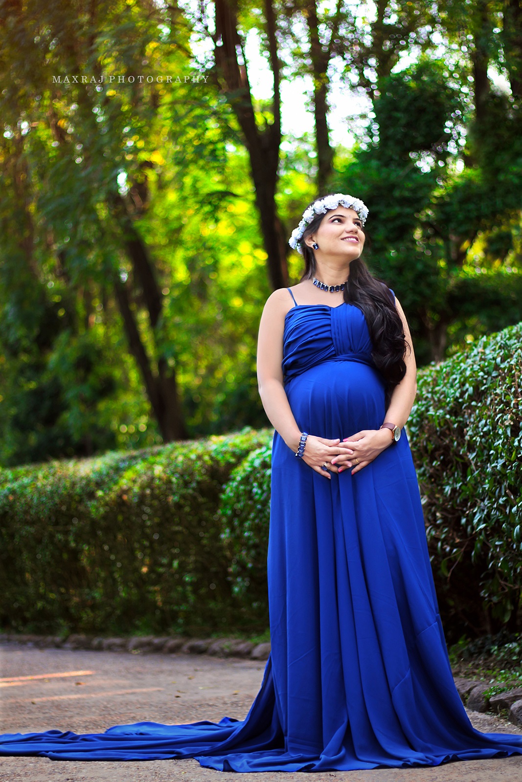 maternity photo shoot of pregnant lady in blue gown in pune
