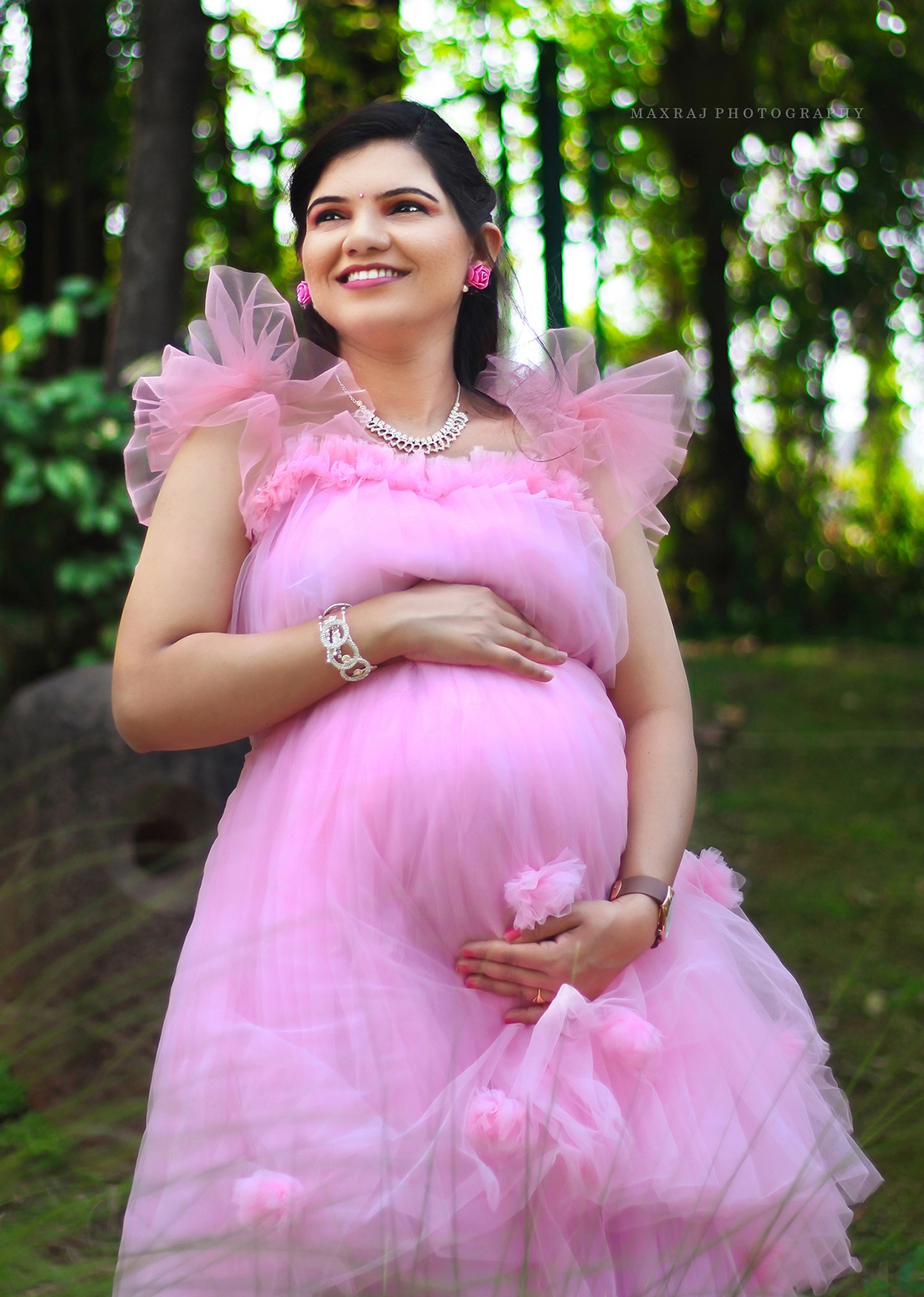 pregnancy photoshoot in pink gown in pune